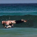 Bystanders help attacked Michael Cohen ashore. Photo: Mirror.